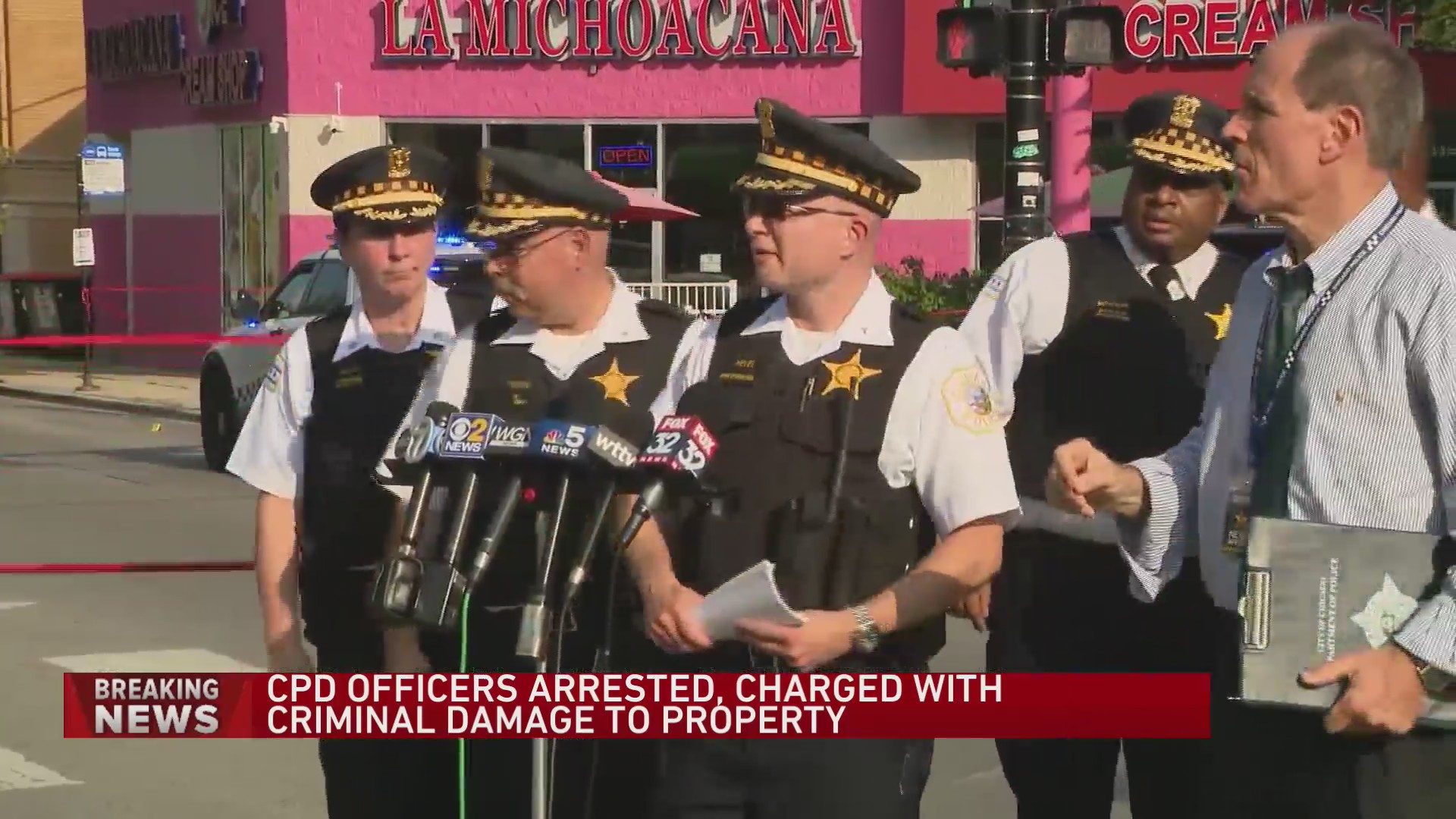 Two CPD officers arrested, charged with criminal damage to property ...