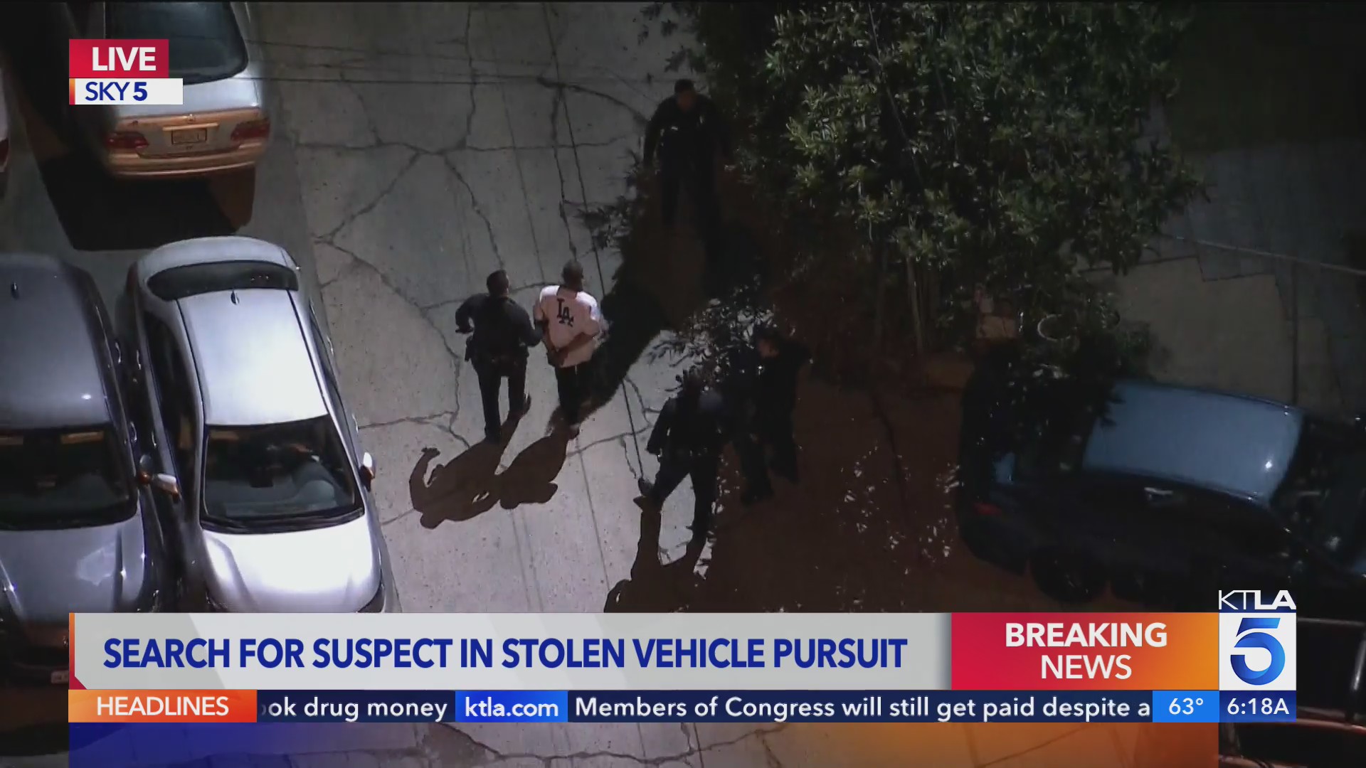Early-morning stolen vehicle pursuit leads to armed man in Dodgers gear ...