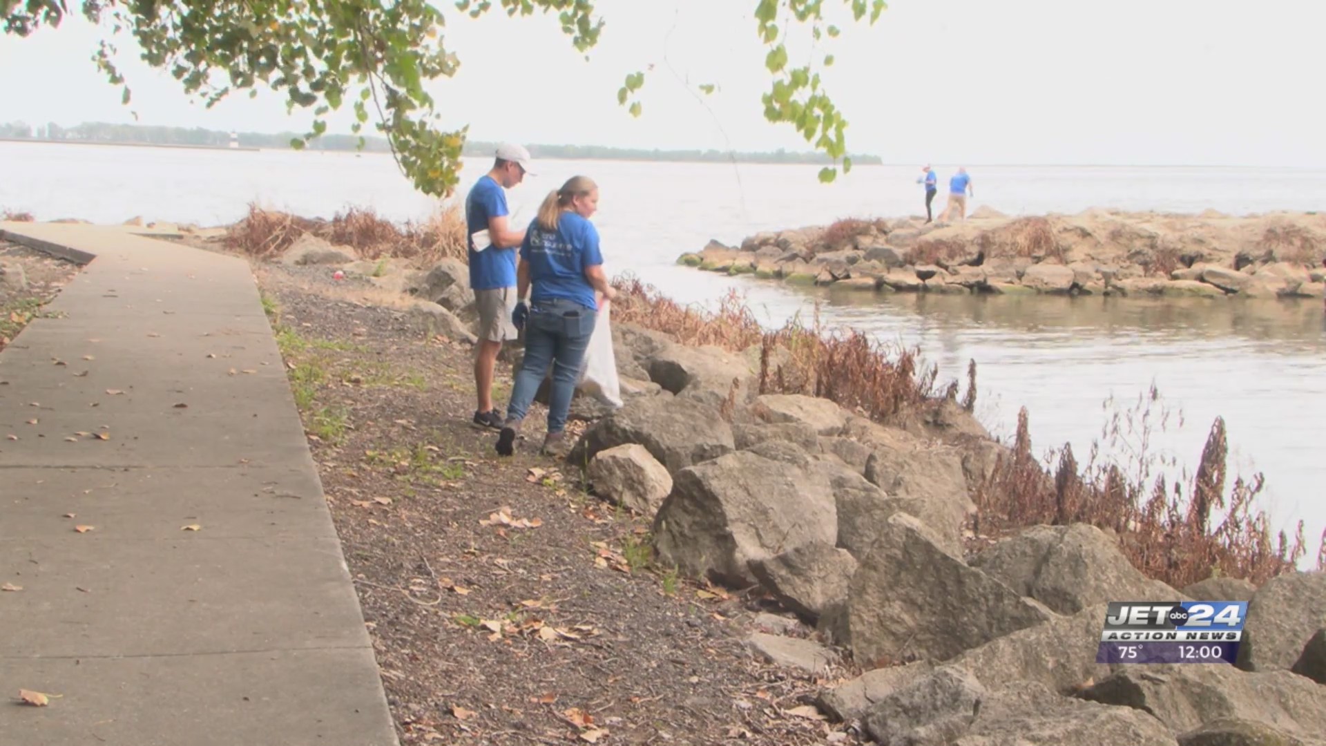 Volunteers clearing out litter along Lake Erie’s shoreline ahead of