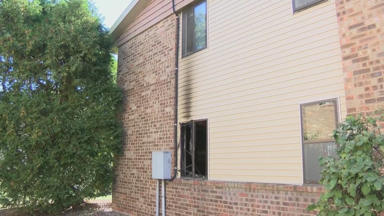 Resident pulled from Oshkosh apartment complex fire, contained to one