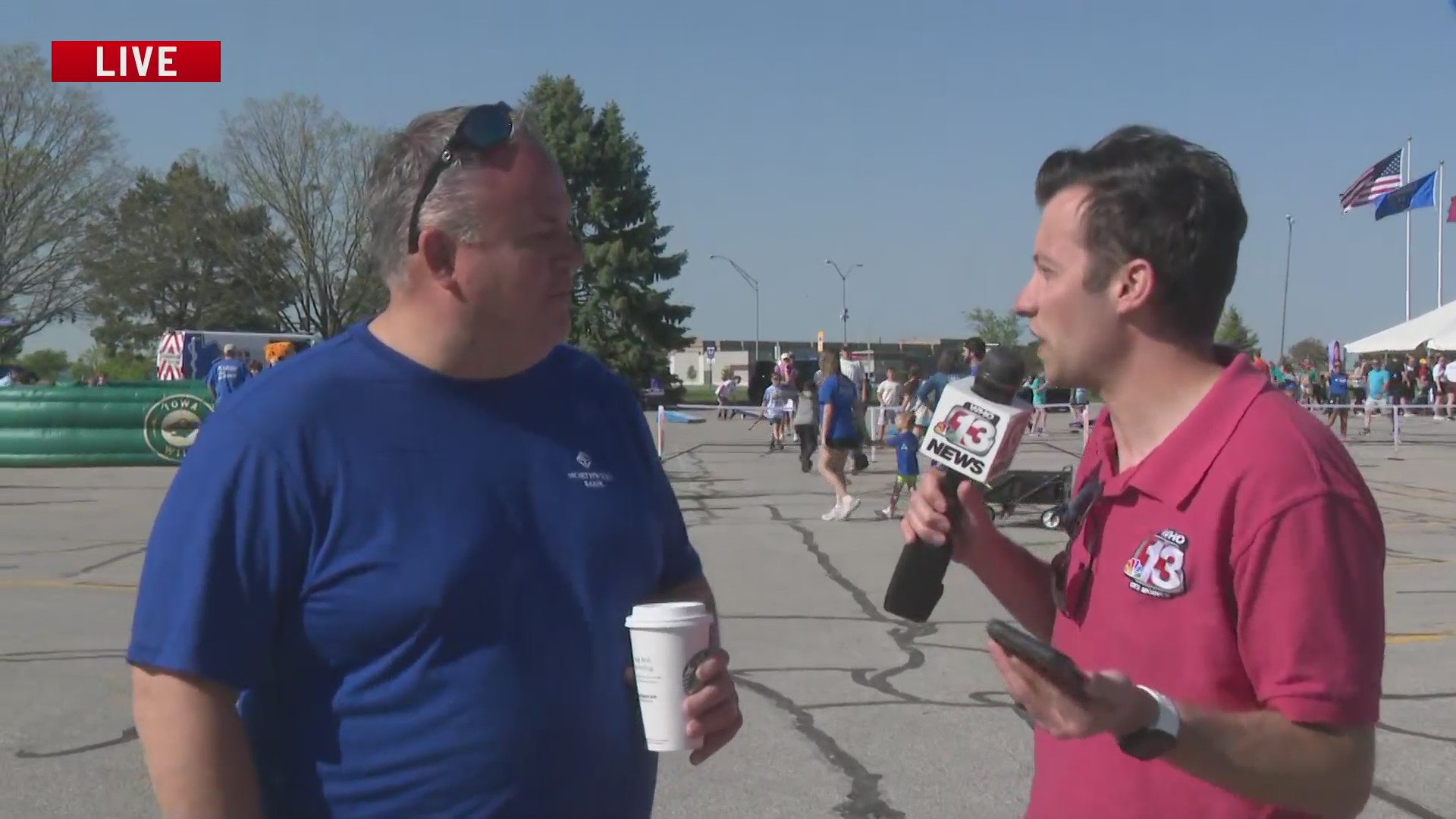 Gabe Prough talks with a sponsor representative at the T1D walk – who13.com