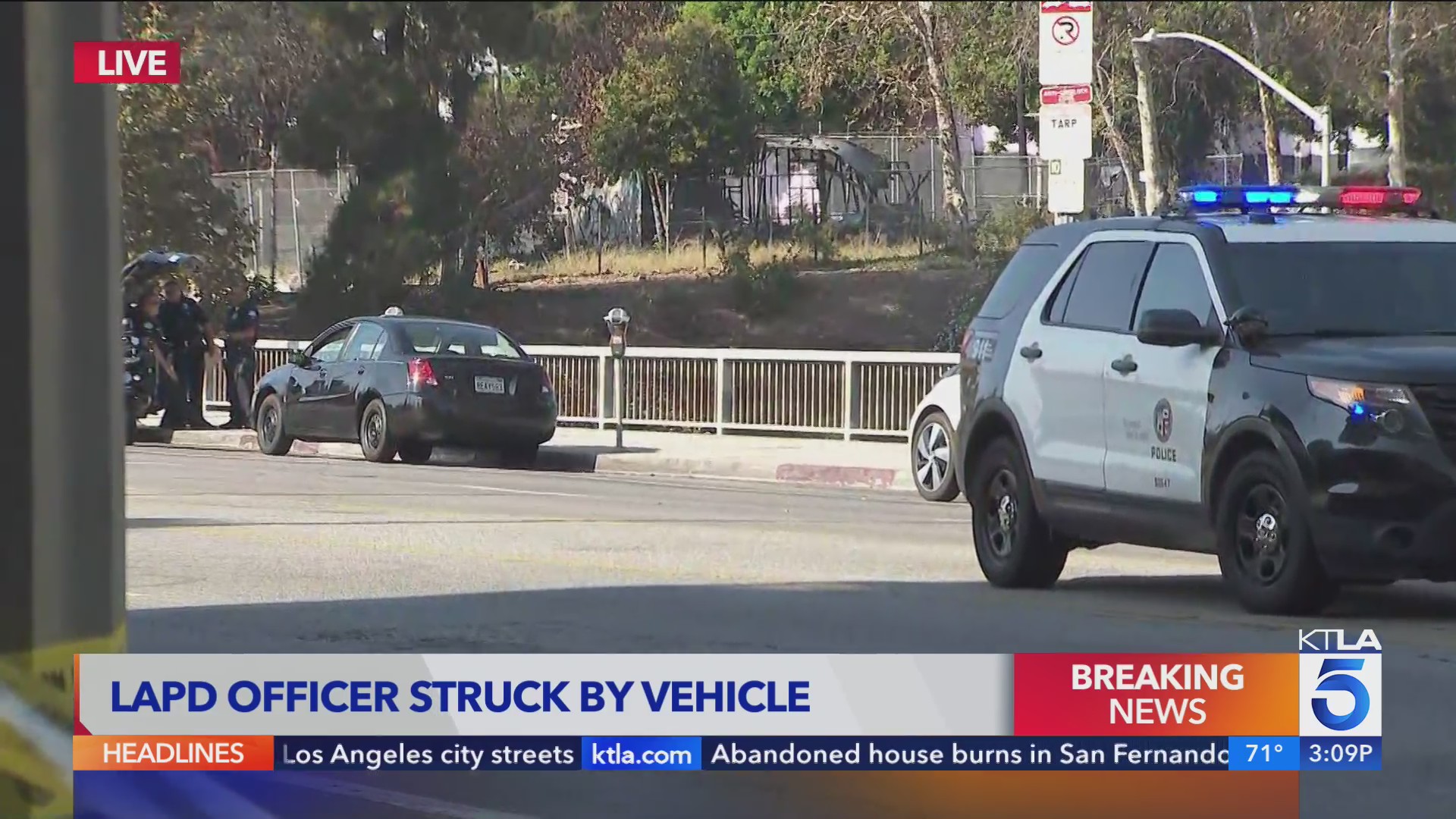 LAPD motorcycle officer struck by vehicle in Chinatown – KTLA