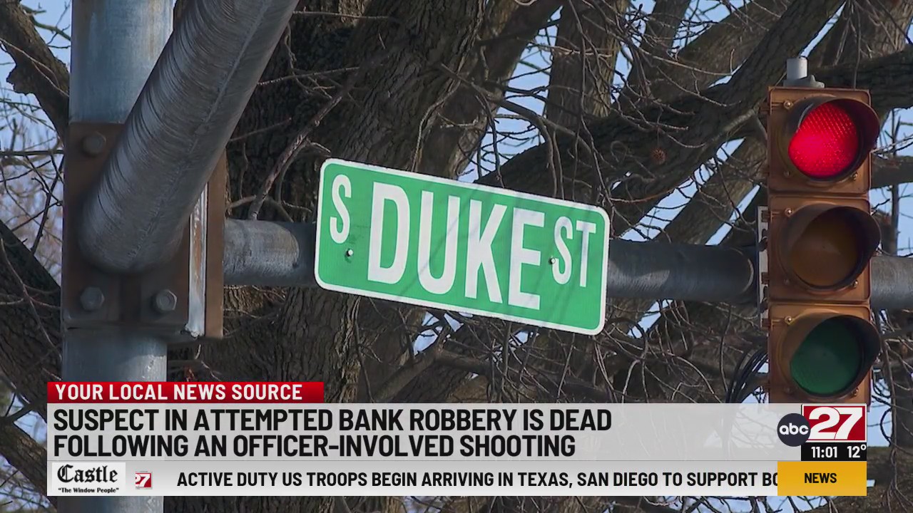 Machete-wielding bank robbery suspect shot, killed by police in ...