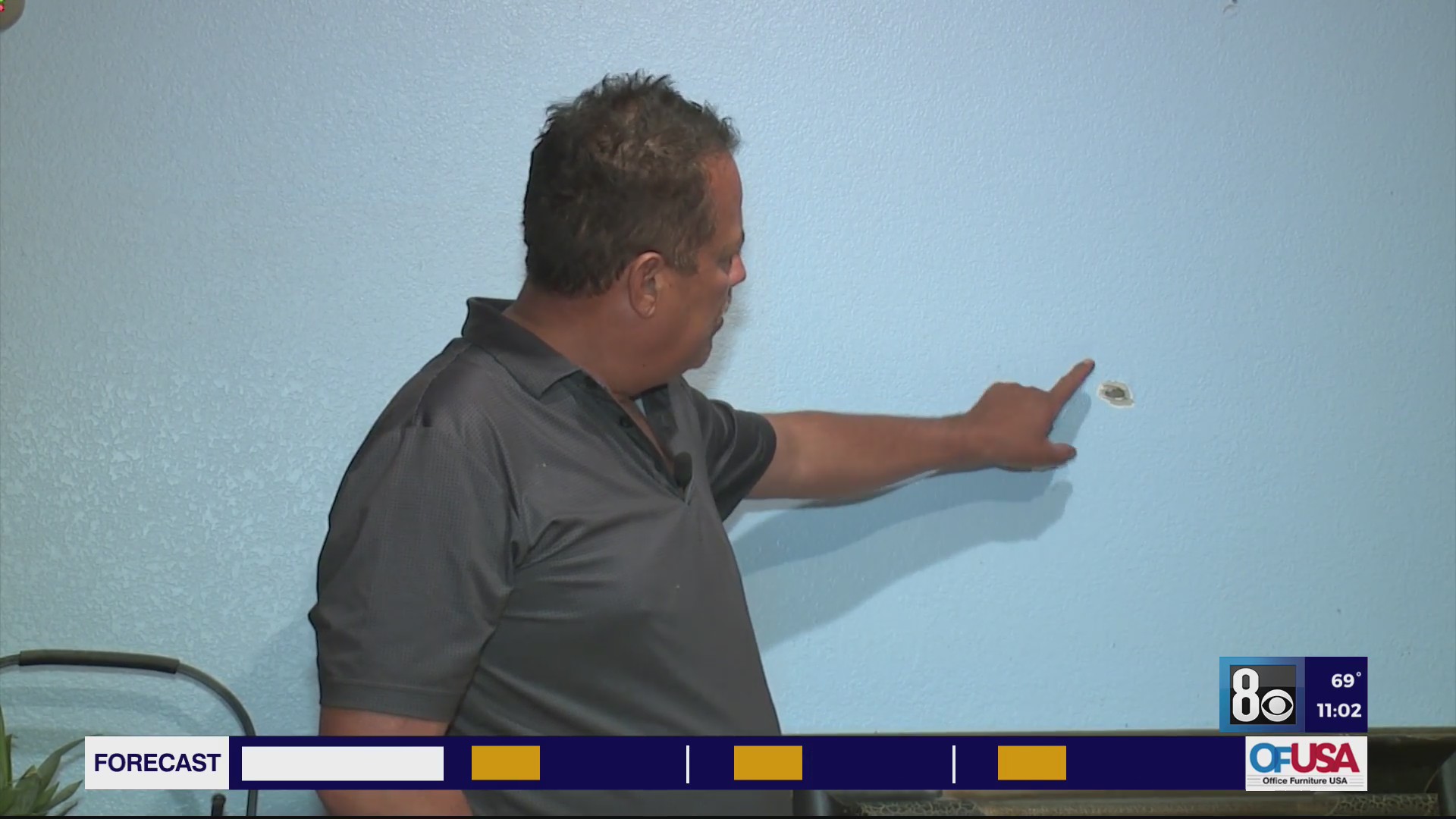 Neighbor shows damage left behind from deadly house party shooting in northeast Las Vegas valley