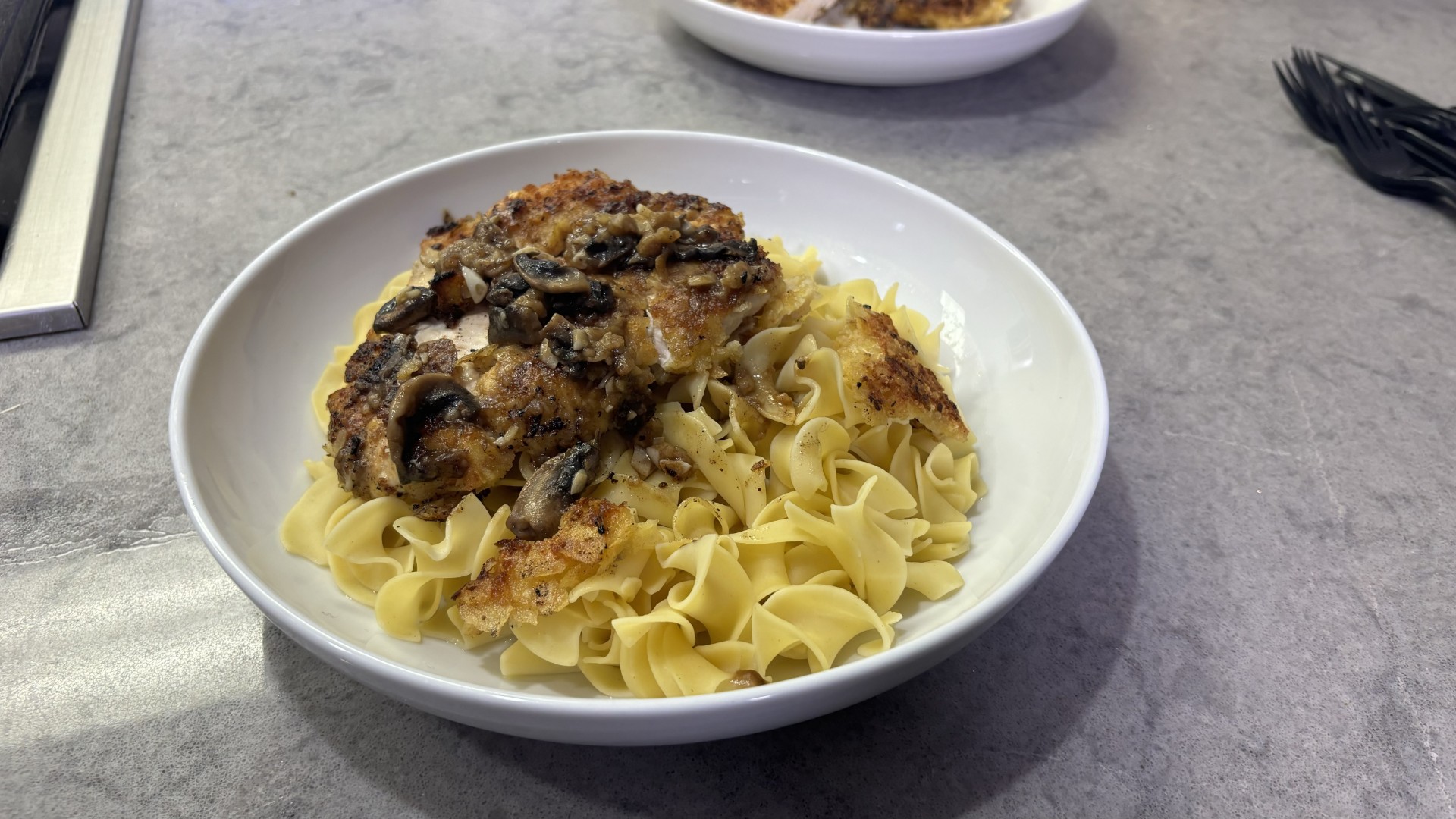 In The Kitchen Chicken Schnitzel Over Egg Noodles