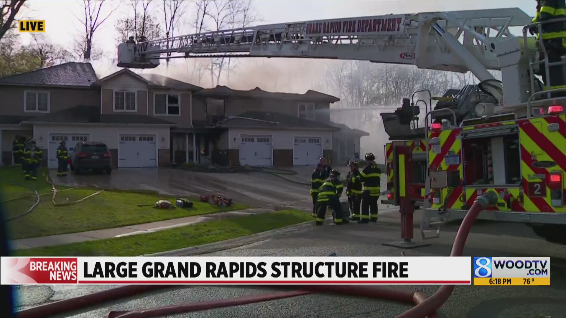 Firefighters work to put out flames at multiplex in Grand Rapids ...
