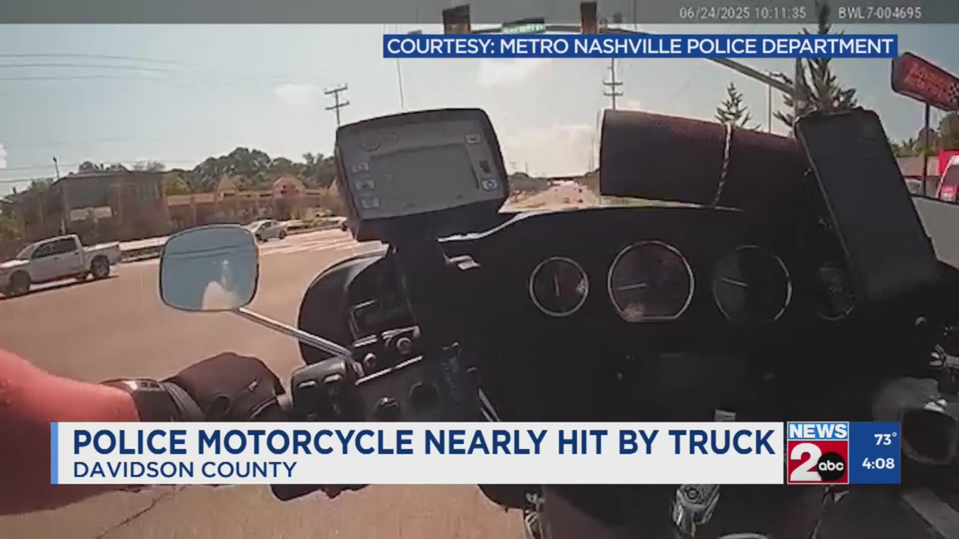 Metro police motorcycle nearly hit by truck – WKRN News 2
