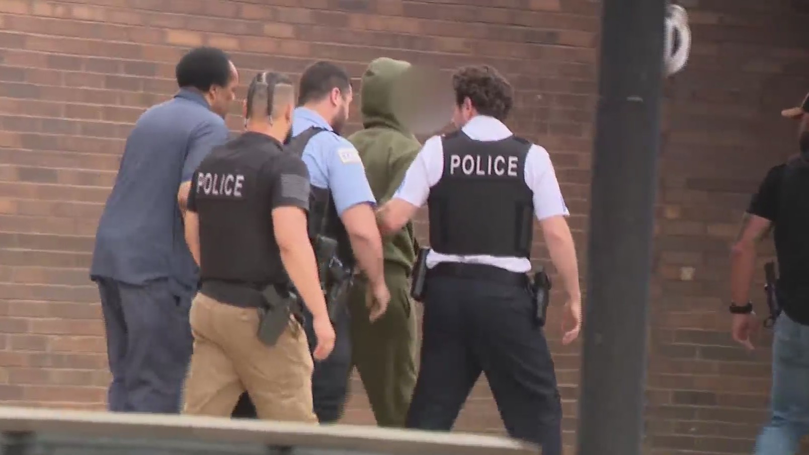 Person of interest in custody in connection with shooting death of ...