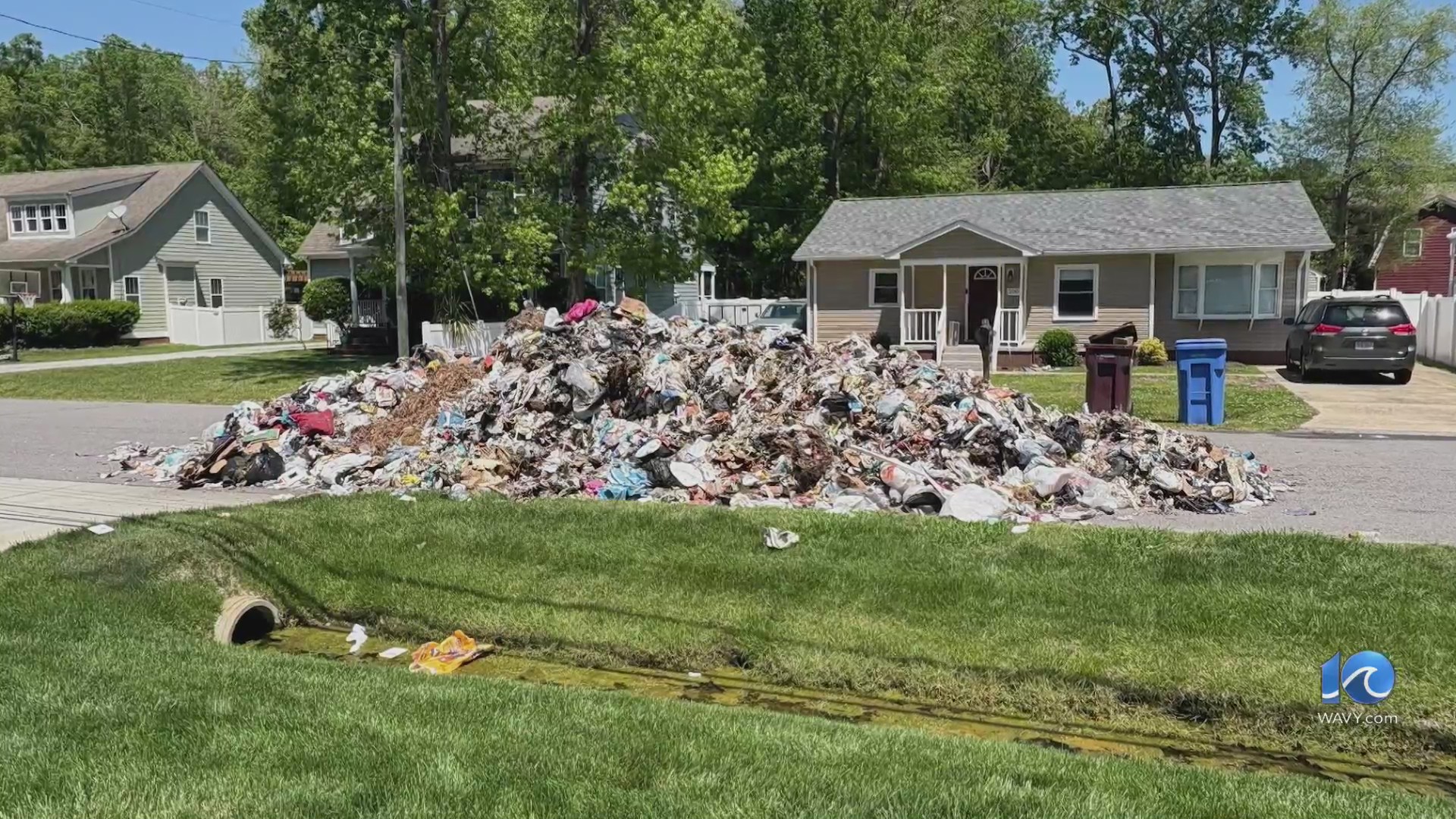 Trash fire forces garbage truck to dump load on street – WAVY.com