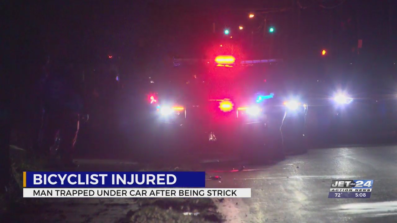 Bicyclist hospitalized after getting hit by car, partially stuck under ...