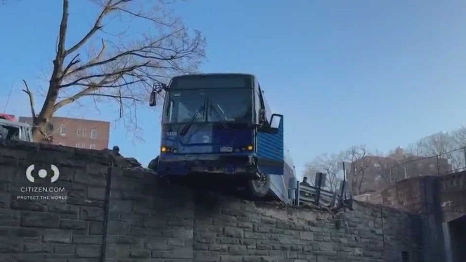 MTA bus dangles from elevated road in the Bronx amid morning commute